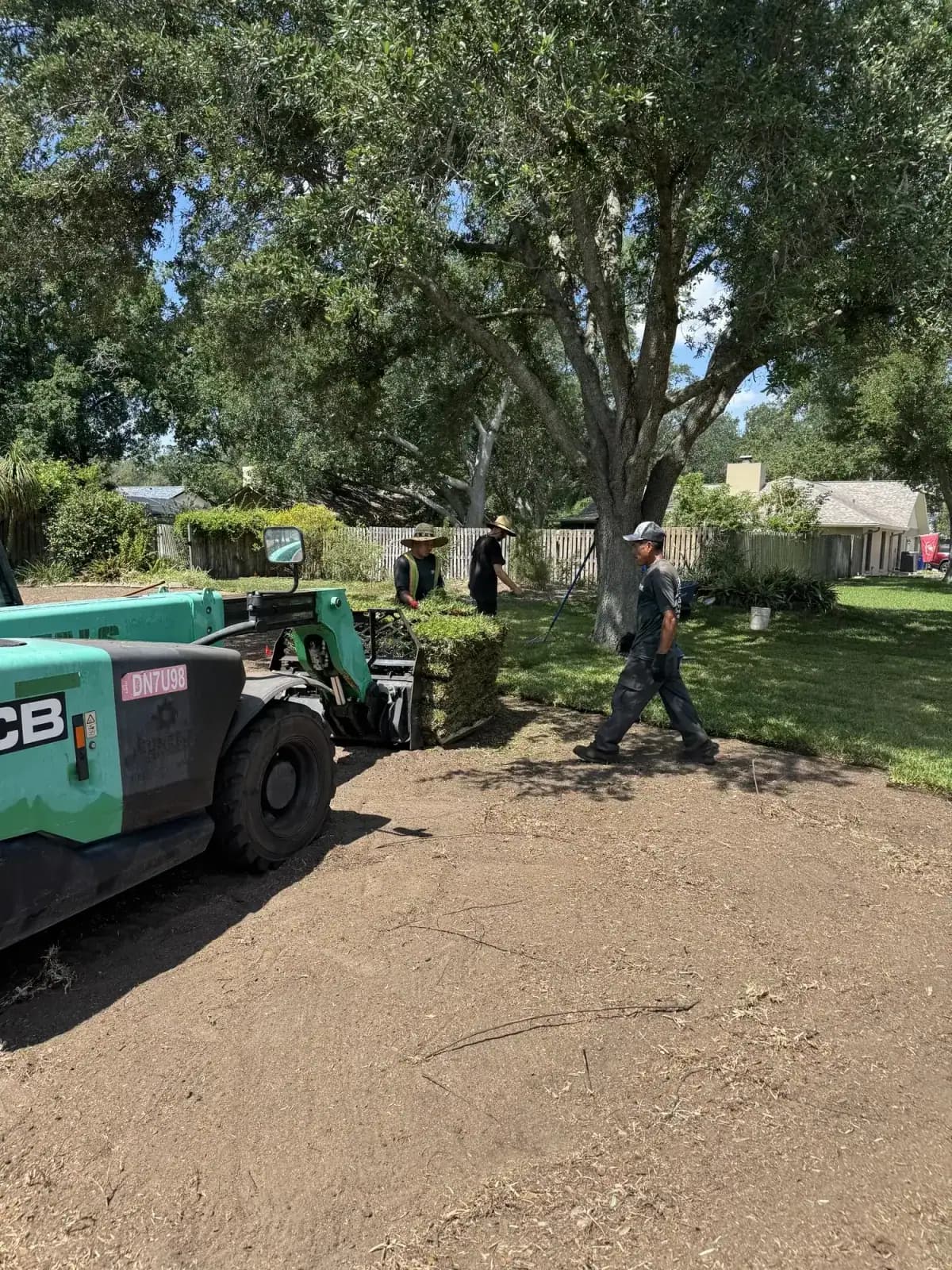The Sod-X crew removing and installing a lawn on a Tampa Bay property